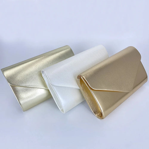 Kleine Umhängetasche mit goldfarbener Kette von Ramitos